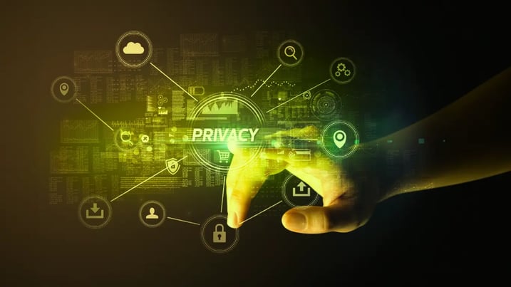 Close-up of a hand selecting a privacy icon on a digital interface with abstract data and security symbols, illustrating digital privacy and cybersecurity concerns.